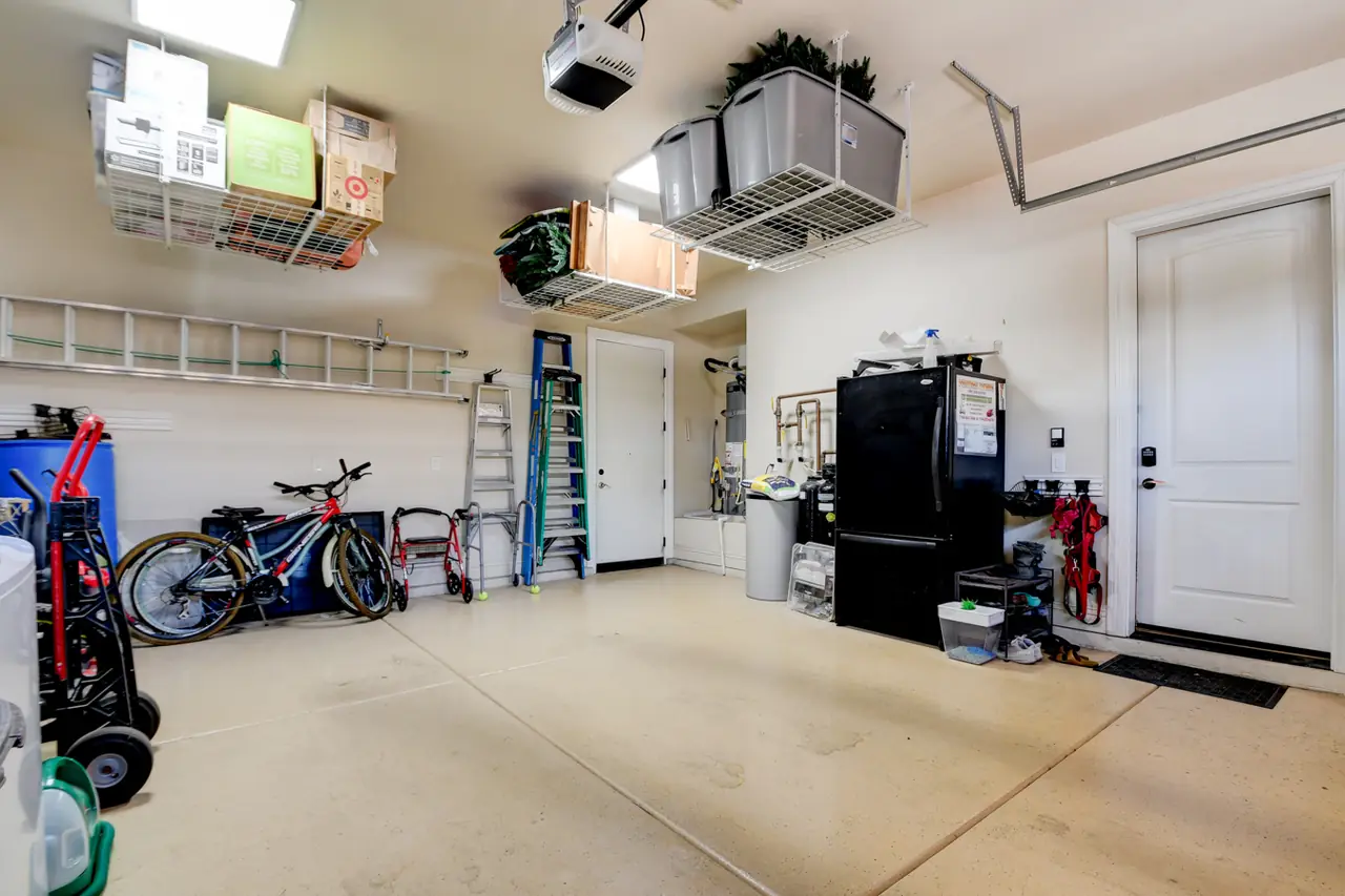 Garage with epoxy floor and overhead storage racks