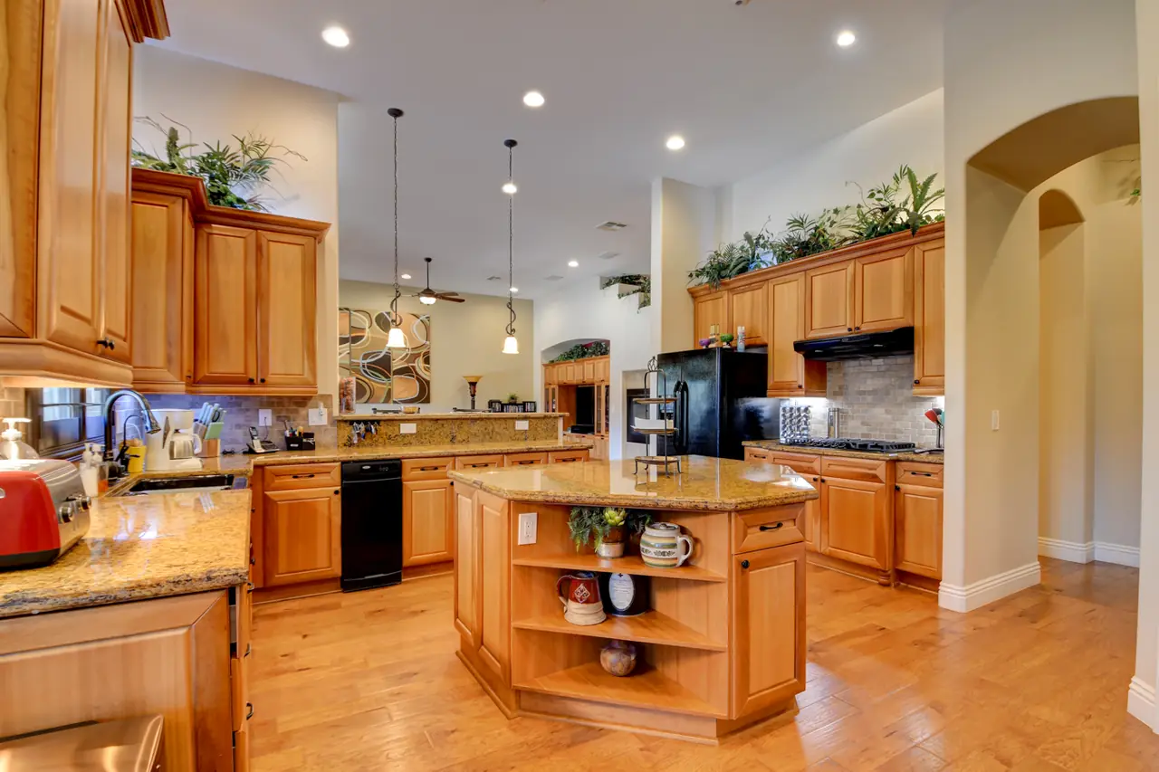 Kitchen sitting area beside the island with abundant cabinet storage